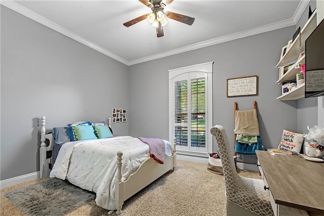 bedroom with ornamental molding, ceiling fan, and carpet