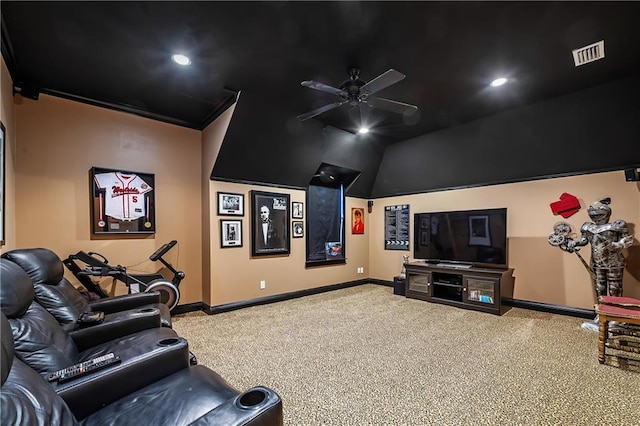 home theater with ceiling fan and carpet flooring