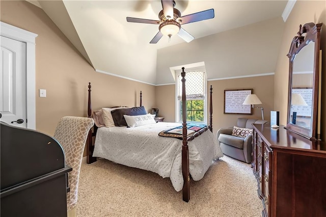 carpeted bedroom featuring ornamental molding, ceiling fan, and vaulted ceiling