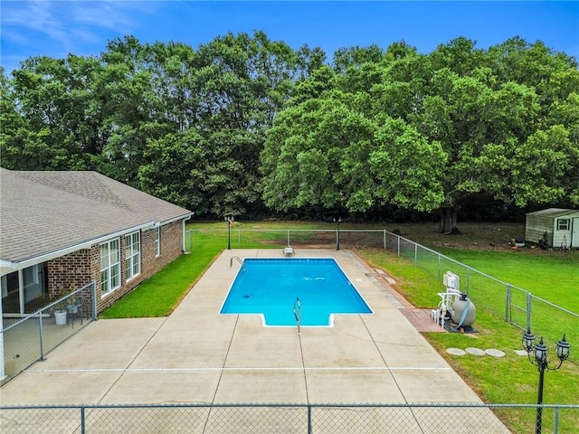 view of pool featuring a fenced in pool, a patio area, a yard, and a fenced backyard