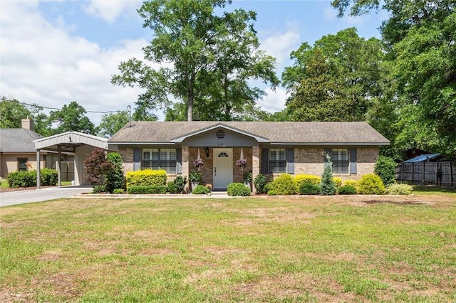 5719 Laurel Dr, Satsuma, AL 36572 - ranch-style home featuring brick siding, driveway, and a carport