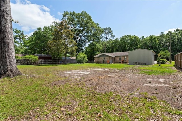 5719 Laurel Dr, Satsuma, AL 36572 - view of yard featuring fence