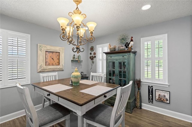5719 Laurel Dr, Satsuma, AL 36572 - dining space featuring a chandelier, a textured ceiling, wood finished floors, baseboards, and recessed lighting
