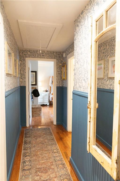 hallway featuring dark wood-type flooring