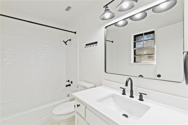 full bathroom featuring washtub / shower combination, vanity, and toilet