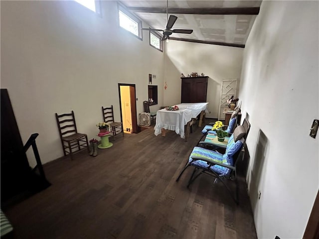 interior space with a high ceiling, wood-type flooring, and ceiling fan