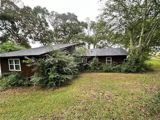 exterior space with a front yard