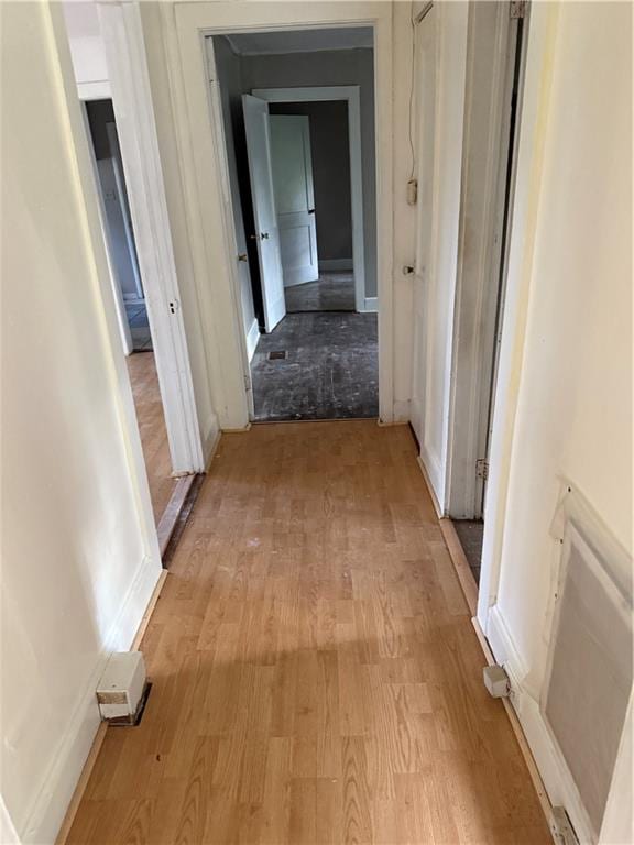 corridor featuring light hardwood / wood-style flooring