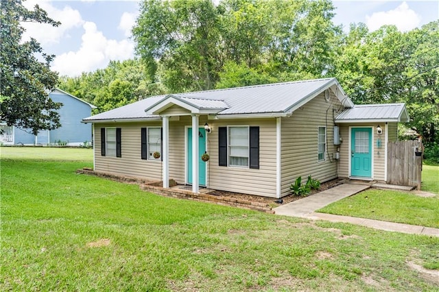 6250 Vivian Broadus Rd, Eight Mile, AL 36613 - ranch-style home with a front lawn and a metal roof