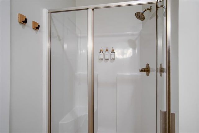 bathroom featuring an enclosed shower