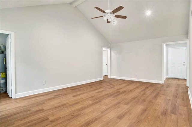 empty room featuring a ceiling fan, high vaulted ceiling, beam ceiling, gas water heater, and light wood finished floors