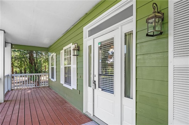 8255A Dixon Rd, Bay Minette, AL 36507 - wooden deck featuring covered porch