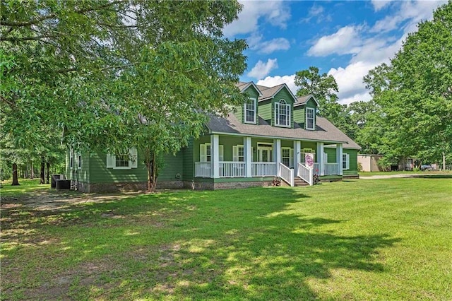 8255A Dixon Rd, Bay Minette, AL 36507 - cape cod house with a porch, a front lawn, crawl space, and central AC