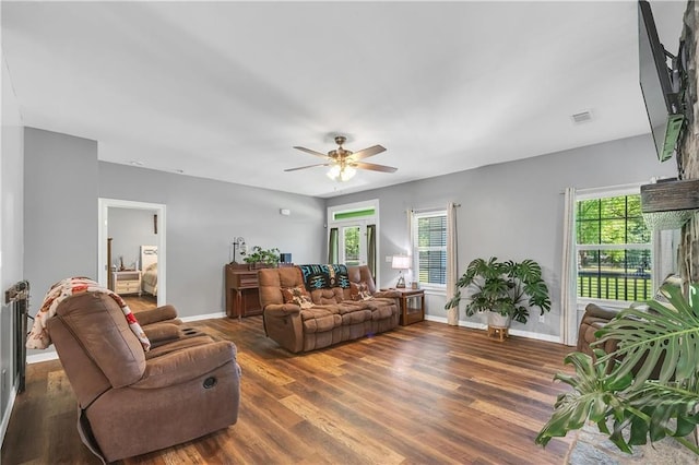 8255A Dixon Rd, Bay Minette, AL 36507 - living area with wood finished floors, ceiling fan, and baseboards