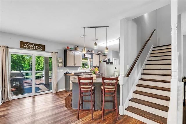 8255A Dixon Rd, Bay Minette, AL 36507 - dining space featuring dark wood-style floors and stairway