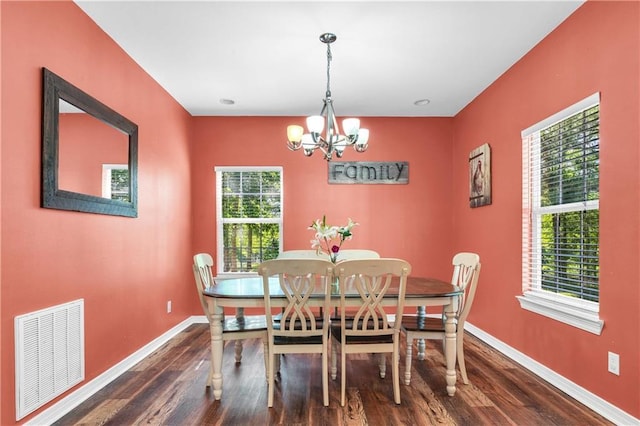 8255A Dixon Rd, Bay Minette, AL 36507 - dining area featuring baseboards, a chandelier, and wood finished floors