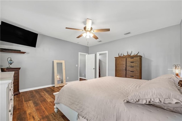 8255A Dixon Rd, Bay Minette, AL 36507 - bedroom featuring dark wood-style flooring, baseboards, and ceiling fan