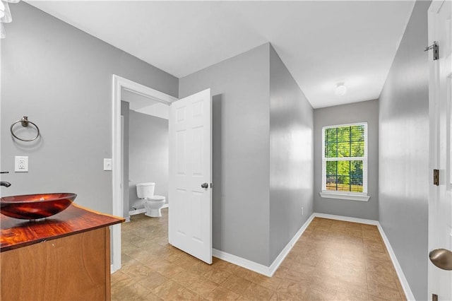 8255A Dixon Rd, Bay Minette, AL 36507 - corridor with a sink, baseboards, and light flooring