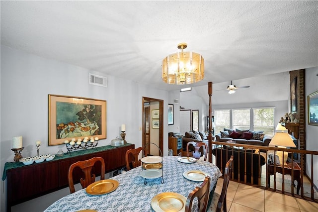 112 Broadmoor Dr, Daphne, AL 36526 - dining space featuring light tile patterned floors, a ceiling fan, and a chandelier
