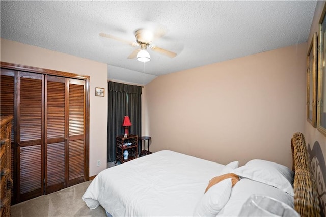 112 Broadmoor Dr, Daphne, AL 36526 - carpeted bedroom featuring a closet, a ceiling fan, and a textured ceiling