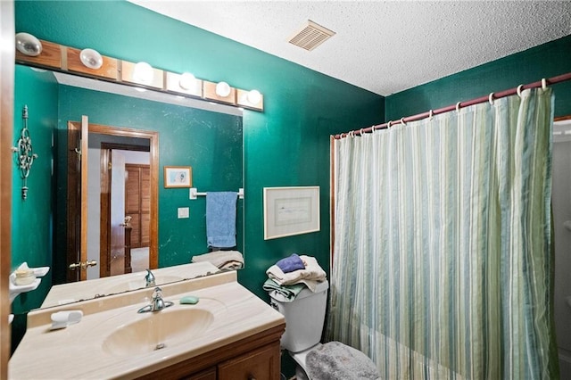 112 Broadmoor Dr, Daphne, AL 36526 - bathroom featuring vanity, a textured ceiling, and a shower with shower curtain