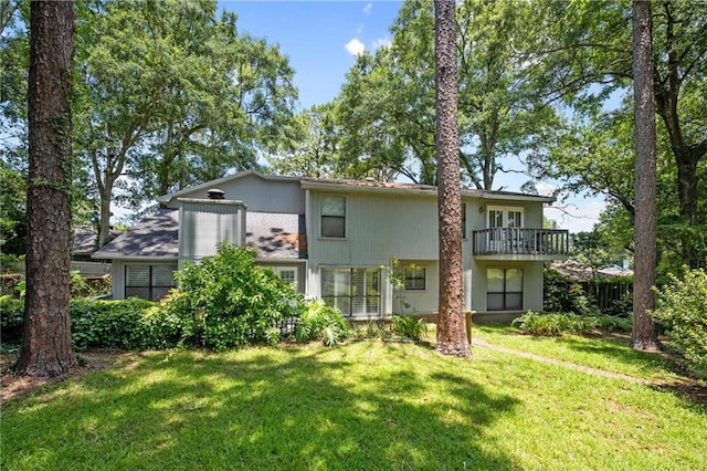 112 Broadmoor Dr, Daphne, AL 36526 - rear view of property featuring a lawn and a balcony