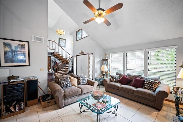 112 Broadmoor Dr, Daphne, AL 36526 - living room with high vaulted ceiling, stairway, plenty of natural light, tile patterned flooring, and ceiling fan