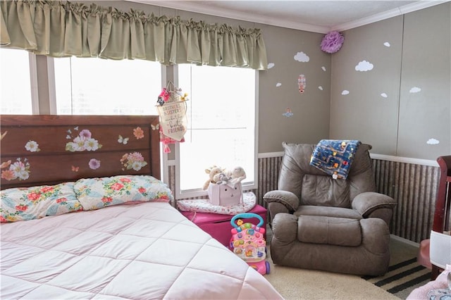 bedroom with light carpet and ornamental molding