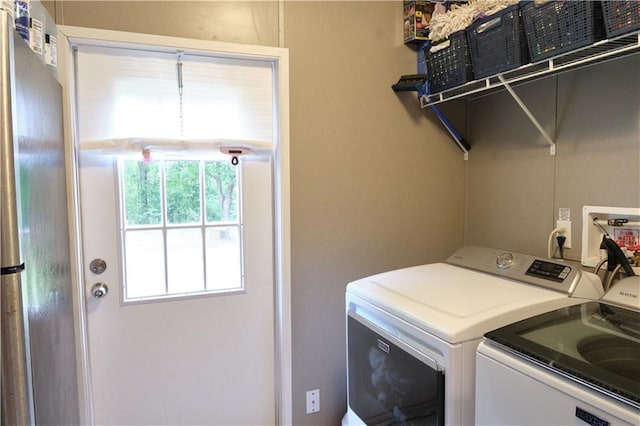 washroom featuring washing machine and clothes dryer and washer hookup