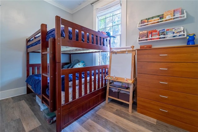 7 Reed Ave N, Mobile, AL 36604 - bedroom featuring ornamental molding, wood finished floors, and baseboards