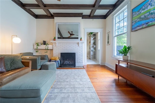 7 Reed Ave N, Mobile, AL 36604 - living room with coffered ceiling, hardwood / wood-style flooring, beam ceiling, a fireplace, and baseboards