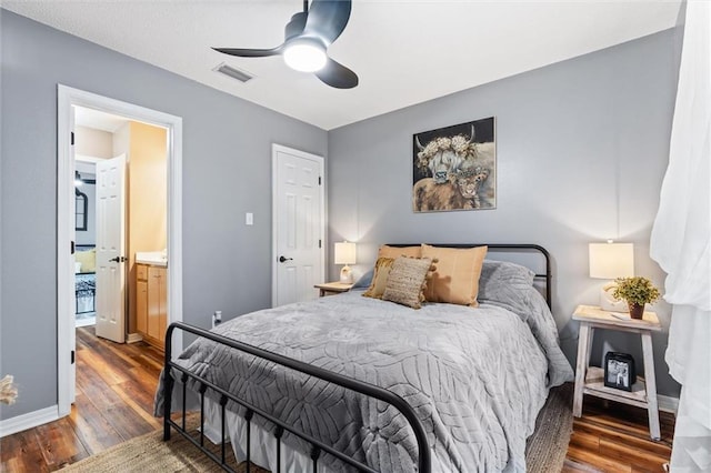 901 La Mothe Pl, Dauphin Island, AL 36528 - bedroom featuring ceiling fan, visible vents, baseboards, and wood finished floors