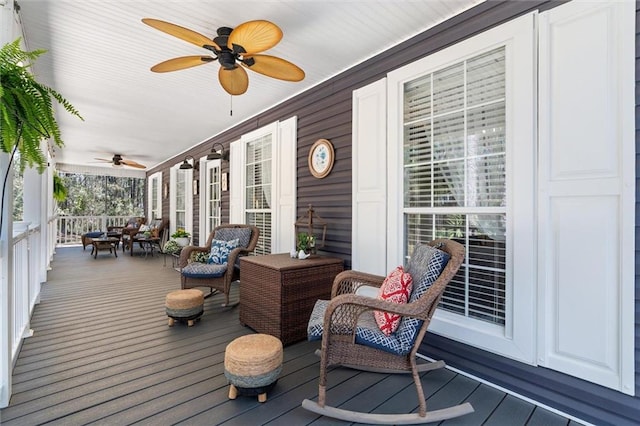 901 La Mothe Pl, Dauphin Island, AL 36528 - wooden deck featuring a porch and ceiling fan
