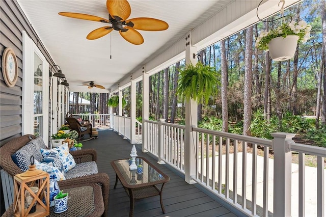 901 La Mothe Pl, Dauphin Island, AL 36528 - deck with a porch and a ceiling fan