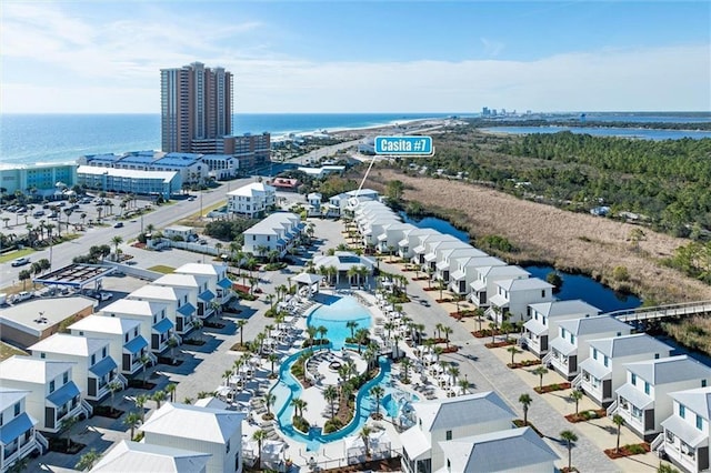 2455 Saltgrass Way, Orange Beach, AL 36561 - drone / aerial view of a large body of water and a pool area