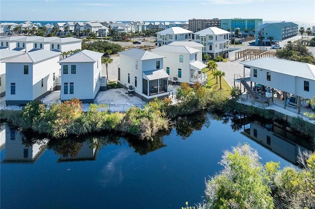 2455 Saltgrass Way, Orange Beach, AL 36561 - aerial perspective of suburban area featuring a large body of water