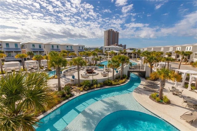 2455 Saltgrass Way, Orange Beach, AL 36561 - community pool featuring a residential view