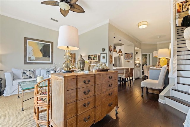 interior space with crown molding and dark hardwood / wood-style floors