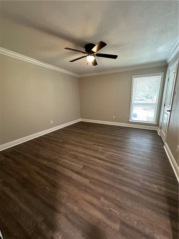 unfurnished room with crown molding, ceiling fan, dark hardwood / wood-style flooring, and a textured ceiling