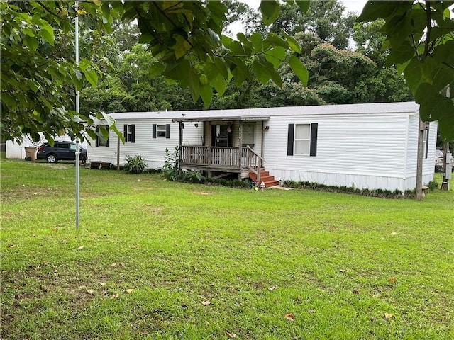 6270 Rester Rd, Theodore, AL 36582 - manufactured / mobile home with a front lawn