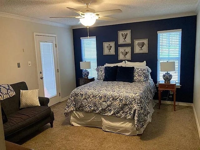 bedroom with carpet floors, a textured ceiling, baseboards, and ornamental molding