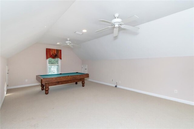 rec room with pool table, ceiling fan, light carpet, and vaulted ceiling