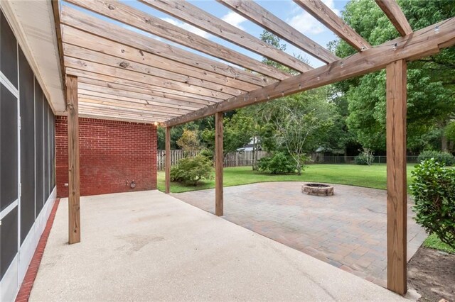 view of patio with a pergola and an outdoor fire pit