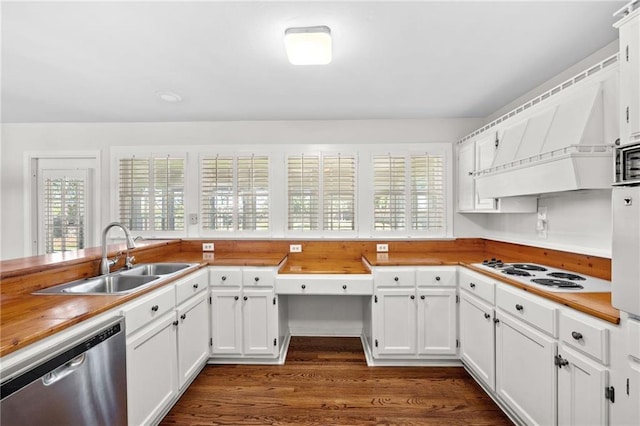 kitchen featuring a sink, stainless steel dishwasher, white electric cooktop, and white cabinets
