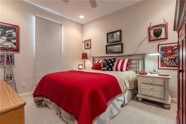 bedroom with light colored carpet and ceiling fan