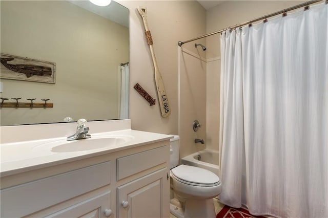 full bathroom featuring vanity, shower / tub combo, and toilet