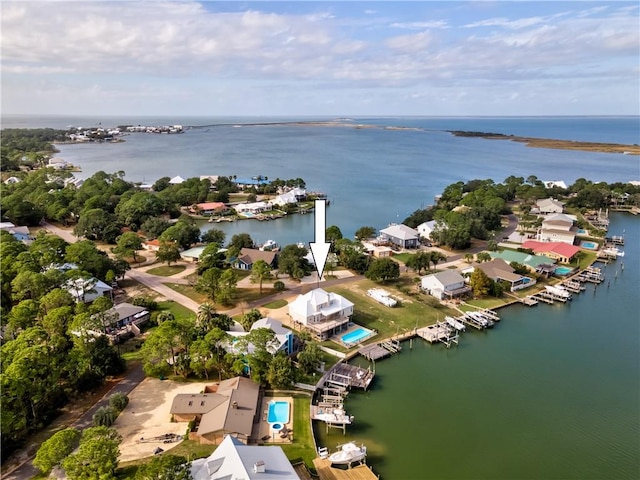 bird's eye view with a water view