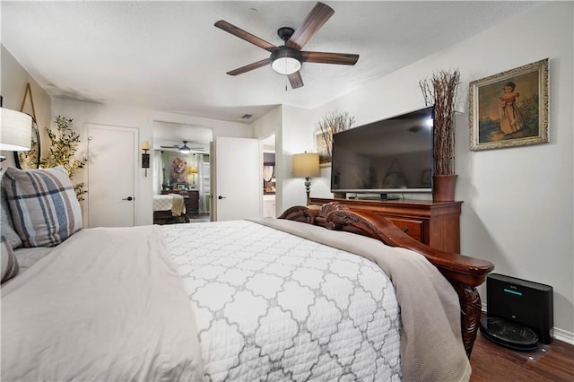 bedroom with wood-type flooring and ceiling fan