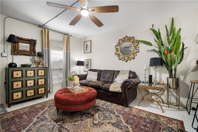 tiled living room with ceiling fan