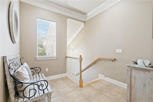 living area with ornamental molding, baseboards, an upstairs landing, and light tile patterned floors